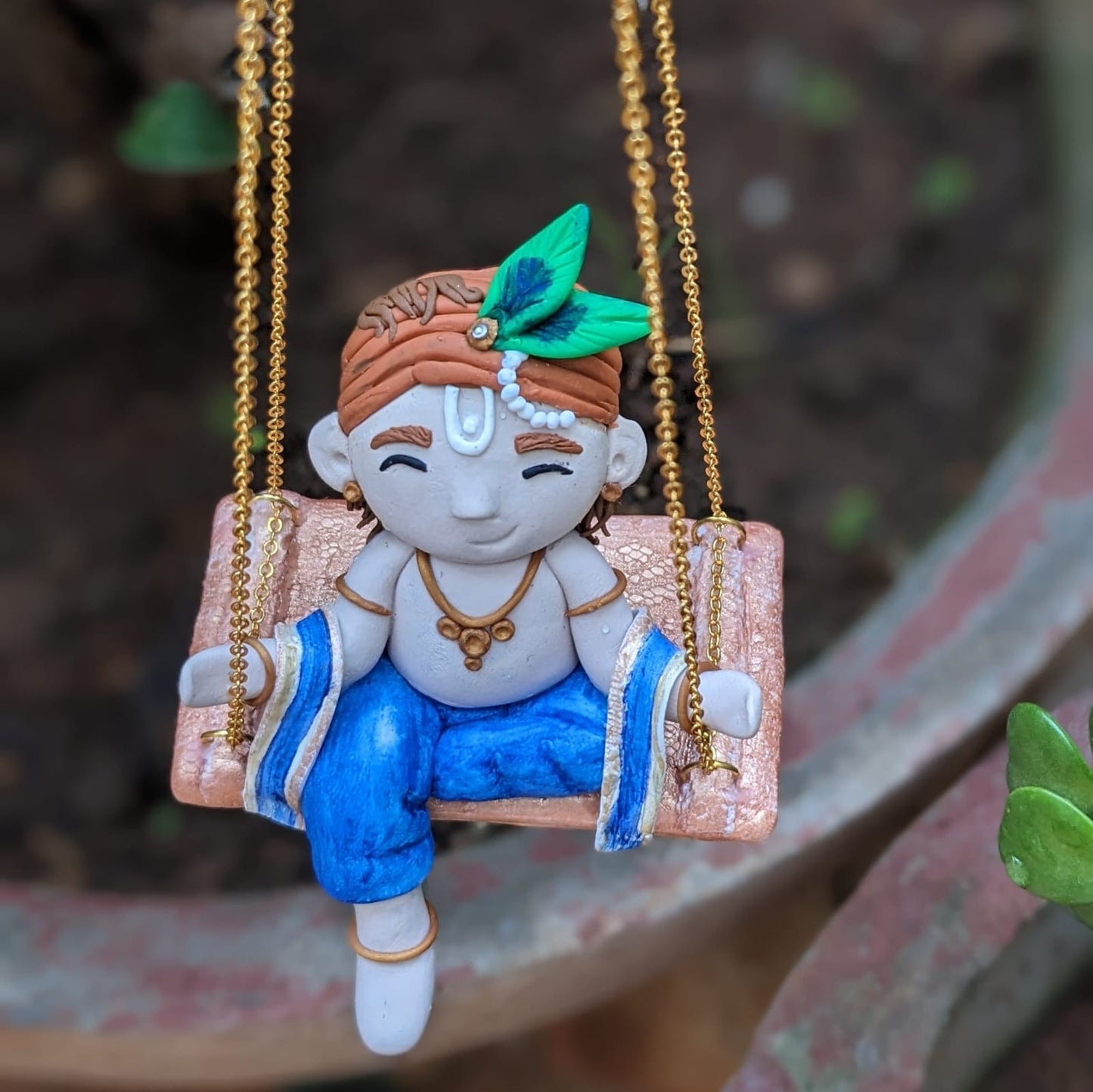 Little Krishna on swing