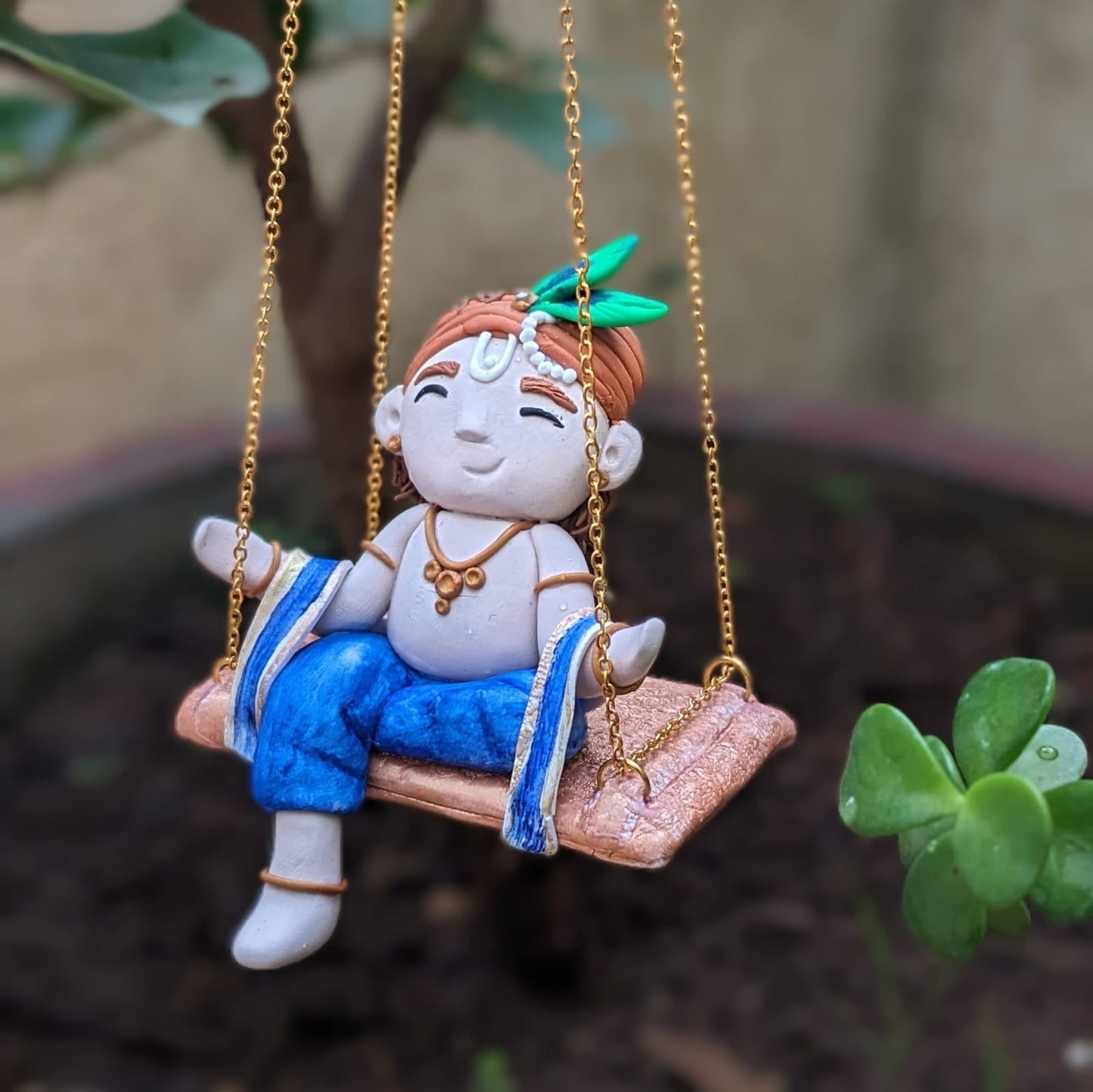 Little Krishna on swing