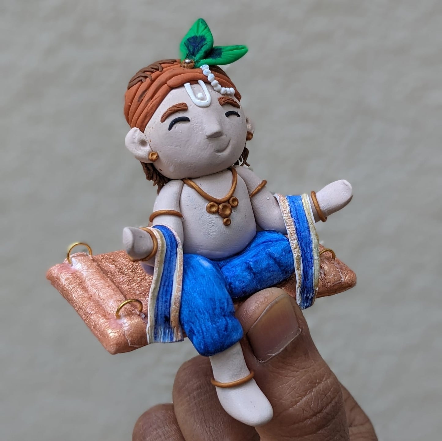 Little Krishna on swing