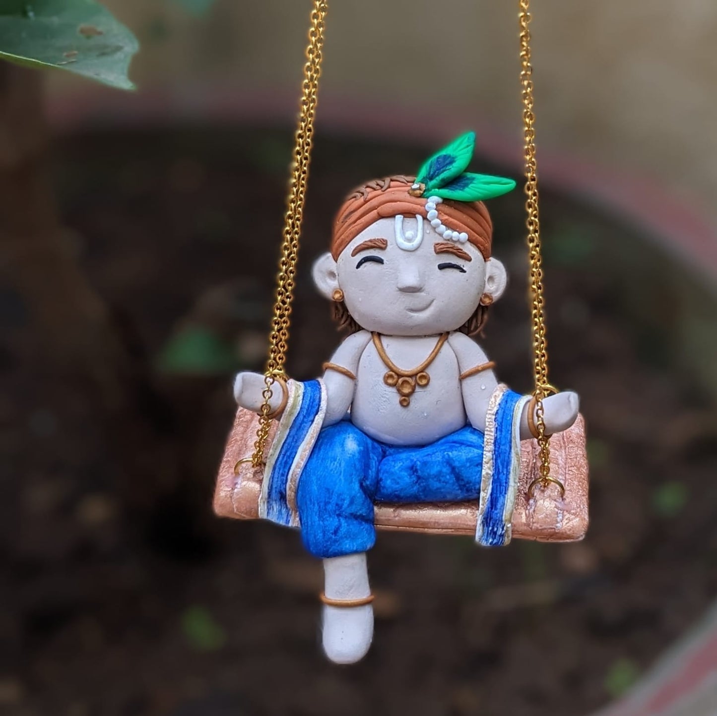 Little Krishna on swing